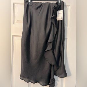 Midi asymmetrical side ruffle skirt.